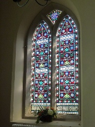 Stained glass window in Elton Church. 