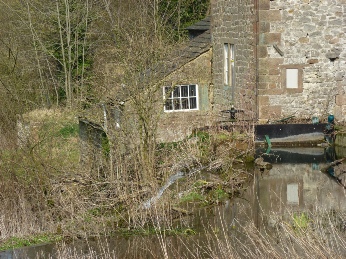 The mill and millpond in Alport.